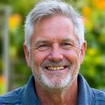 Headshot of James Thunder, a friendly, experienced man with an approachable demeanor, wearing a practical outdoor shirt.