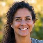 Headshot of Maria Gonzalez, a warm, knowledgeable woman with a thoughtful smile, perhaps in a garden setting.