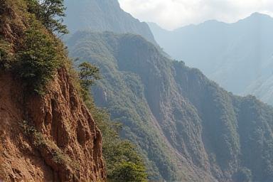 Steep mountain slope with signs of erosion and loose soil